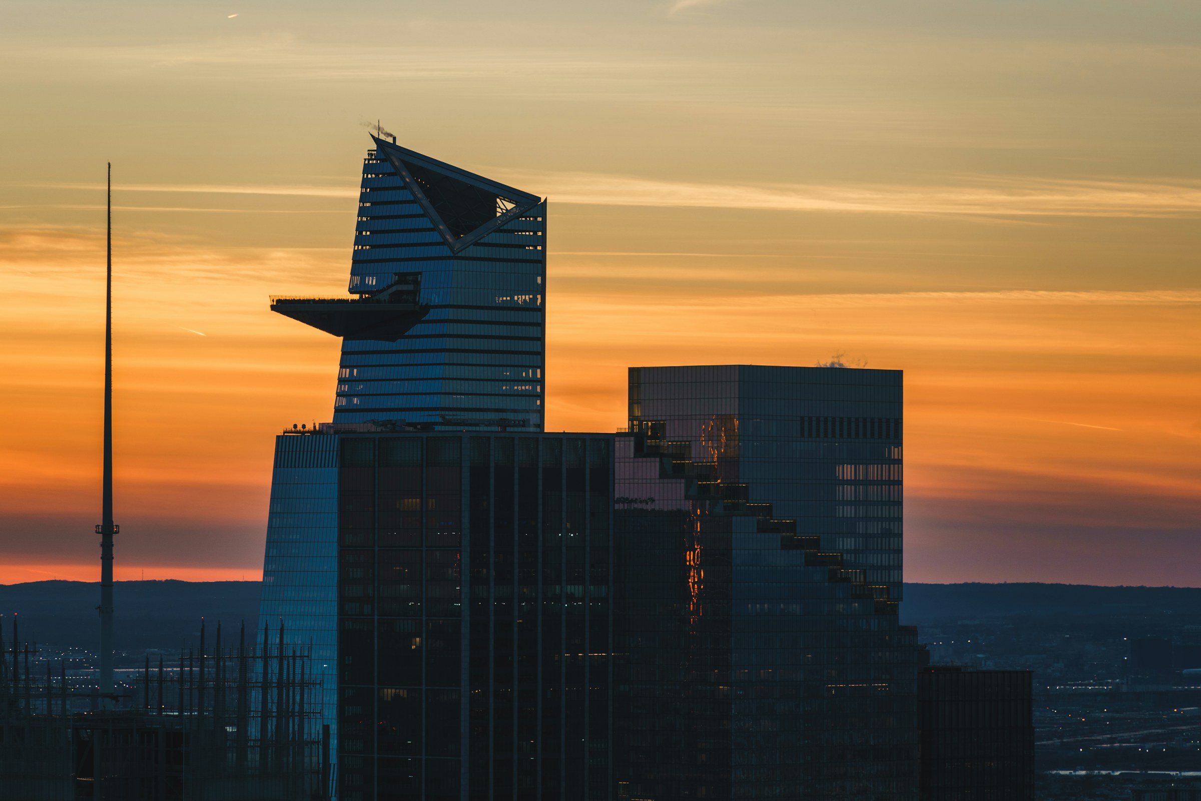 Towers against a sunset sky